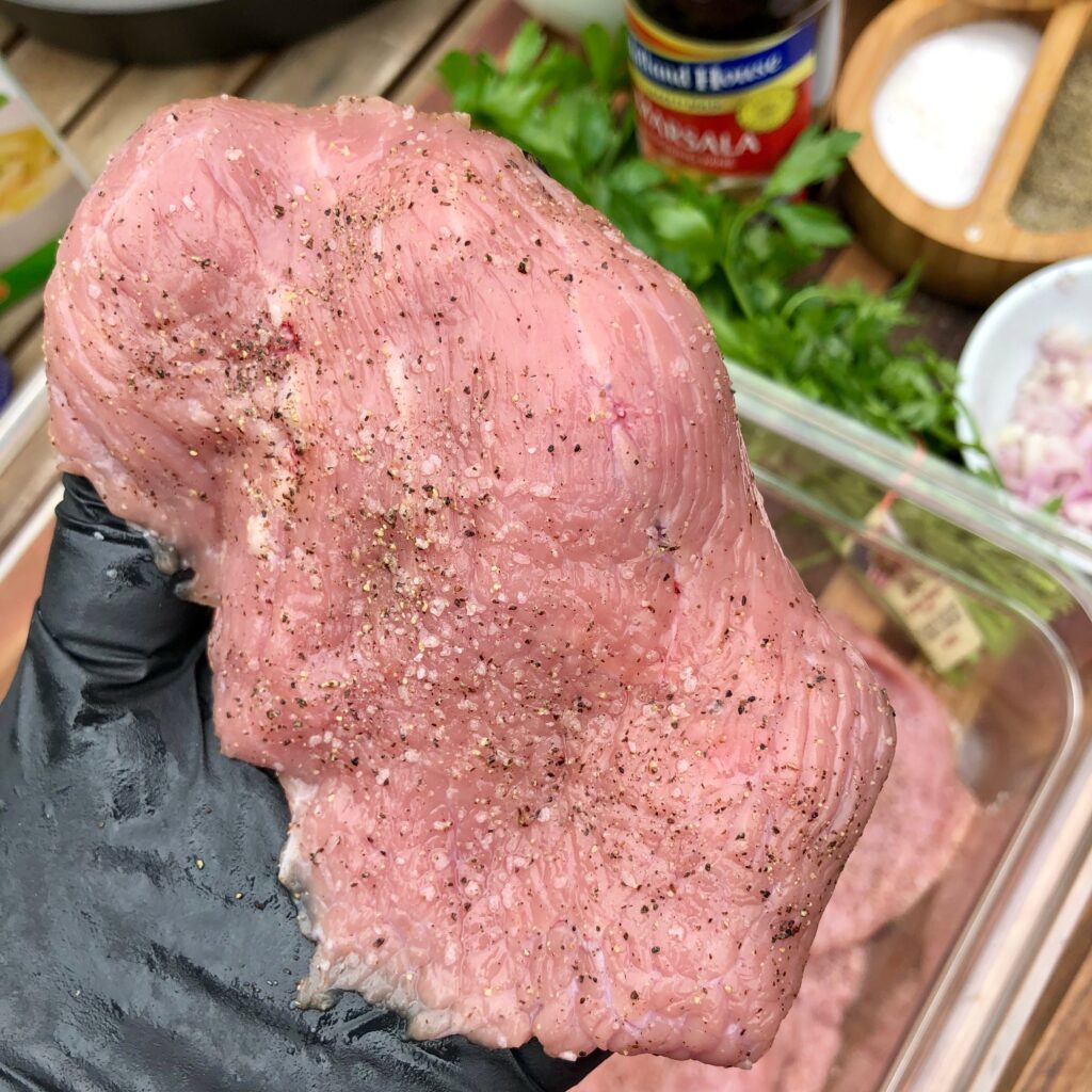 seasoning with salt and pepper