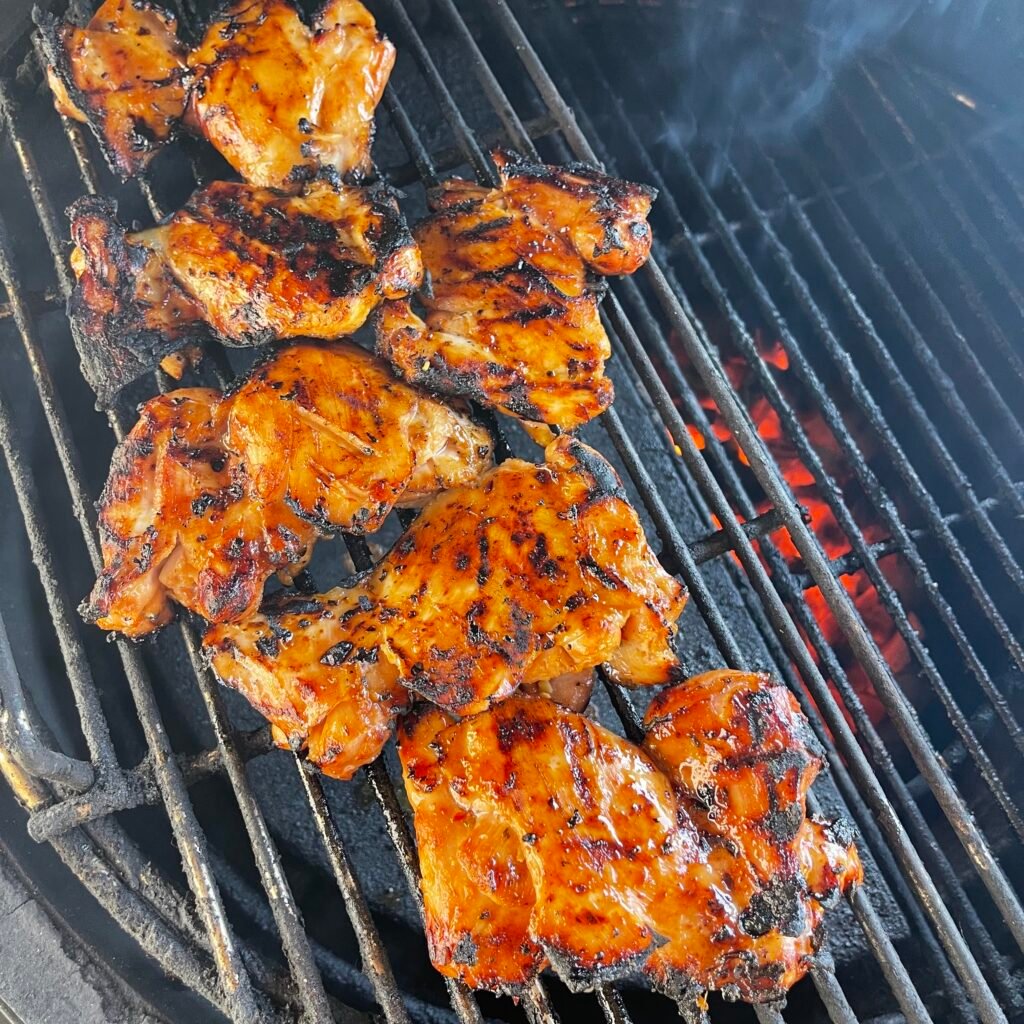 chicken thighs on the grill. 