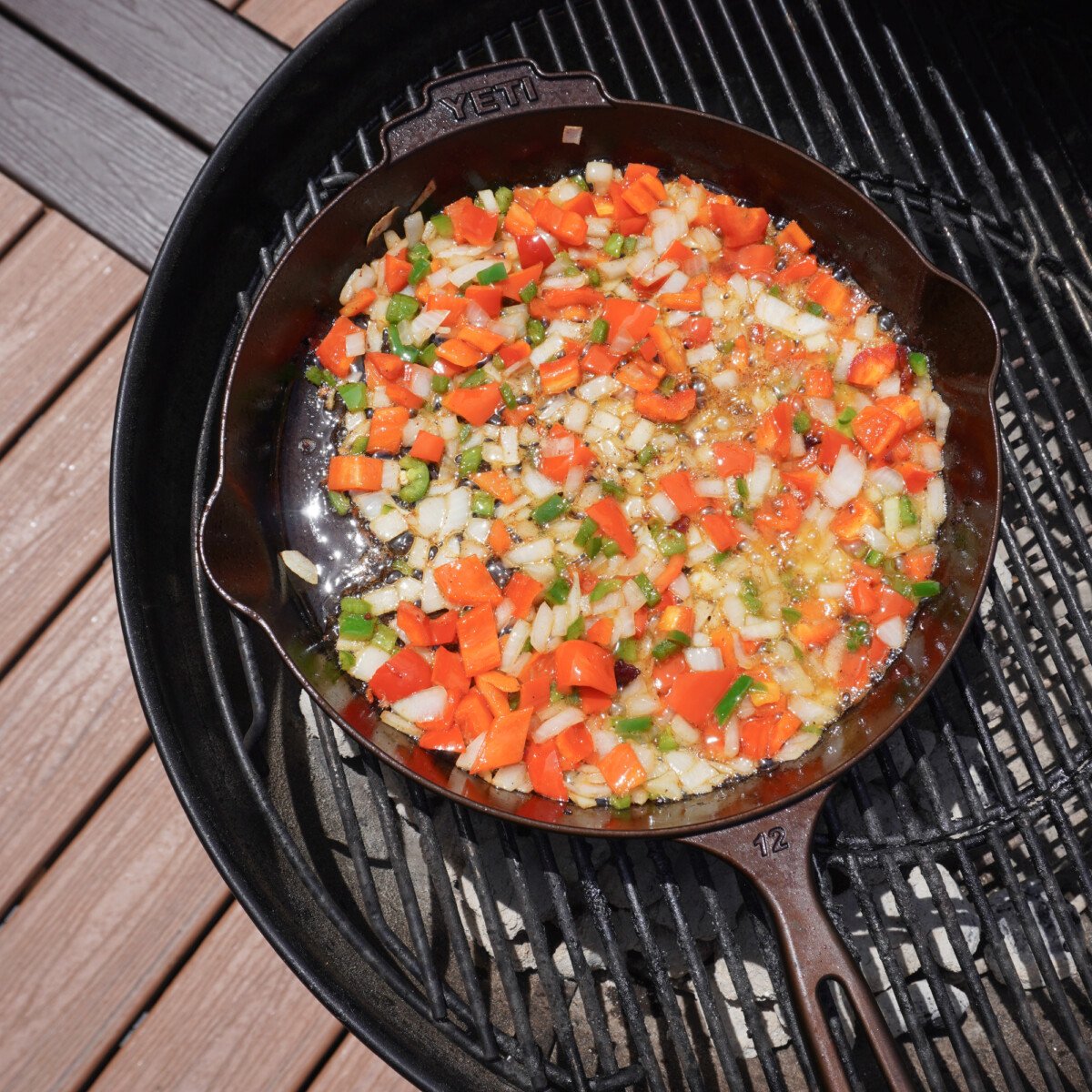 cooked veggies in cast iron skillet.