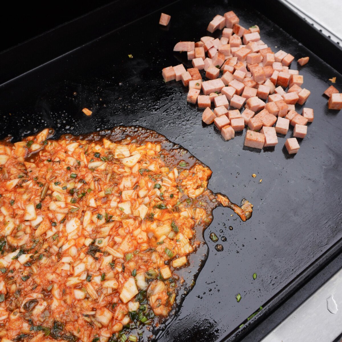 ingredients separated on the griddle.
