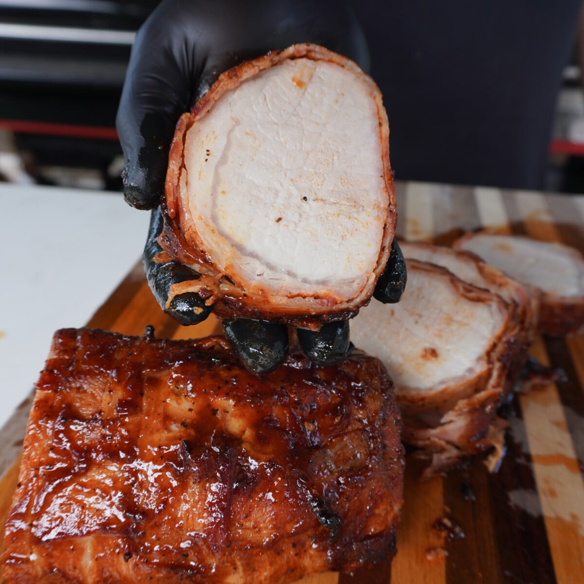 sliced bacon wrapped pork loin.