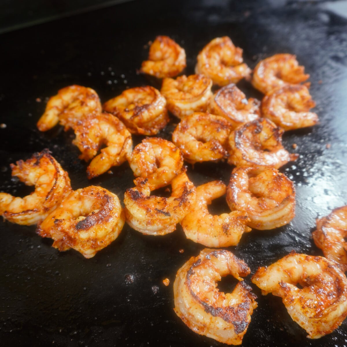 Grilled shrimp on weber slate griddle.