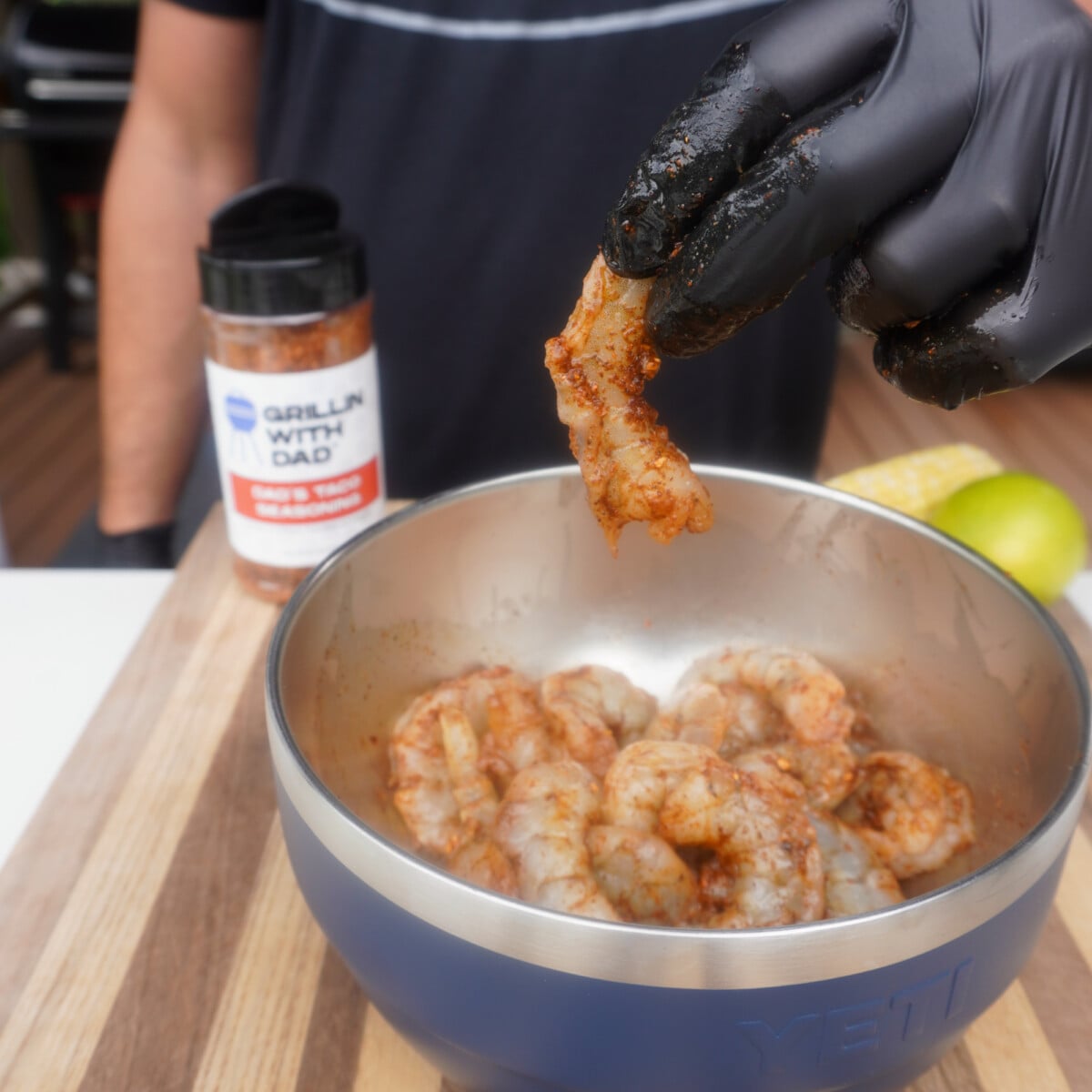 raw shrimp seasoned with Dad's Taco Seasoning in yeti bowl.