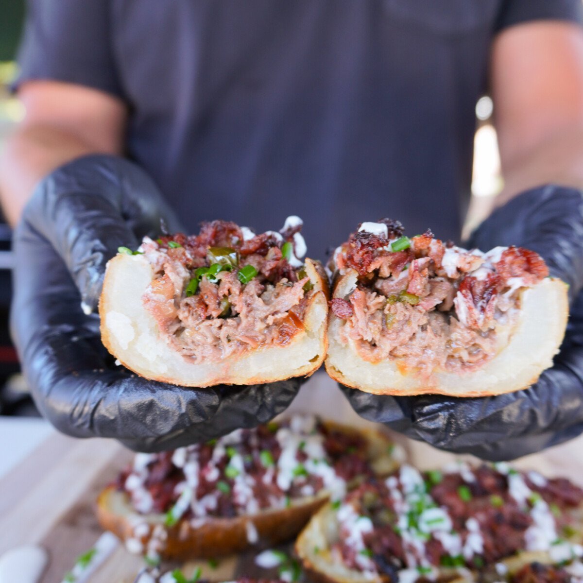 sliced in half grilled cheesesteak potato skins.