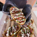 grilled cheesesteak potato skin presented.