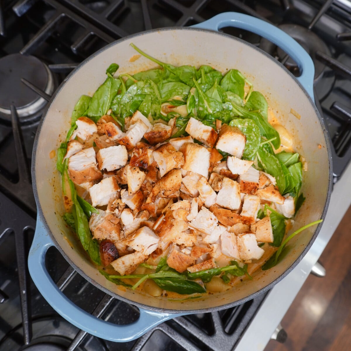 fresh spinach and chopped chicken into marry me chicken soup.