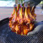 Holiday Crown Roast over a charcoal grill.