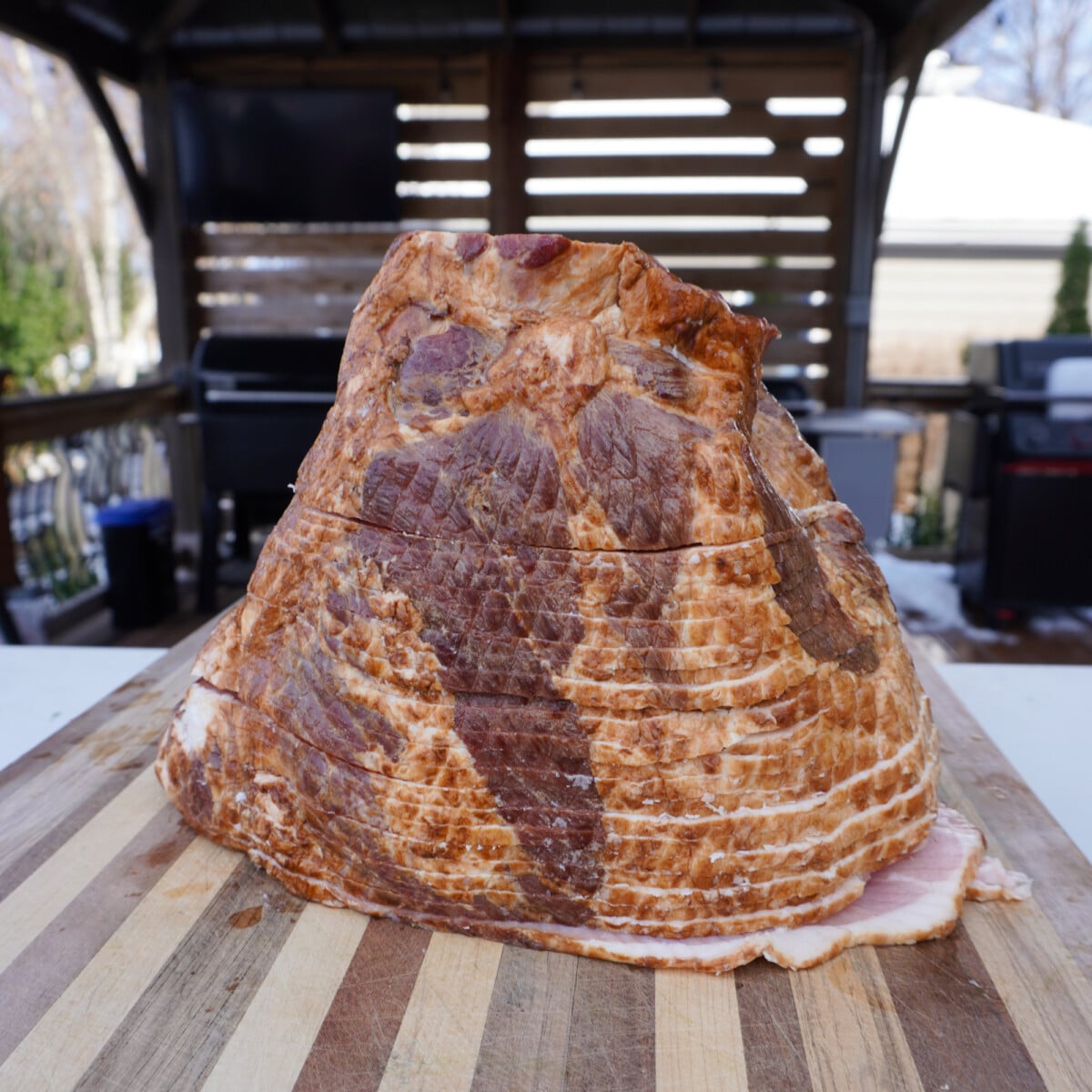 spiraled ham on a cutting board.