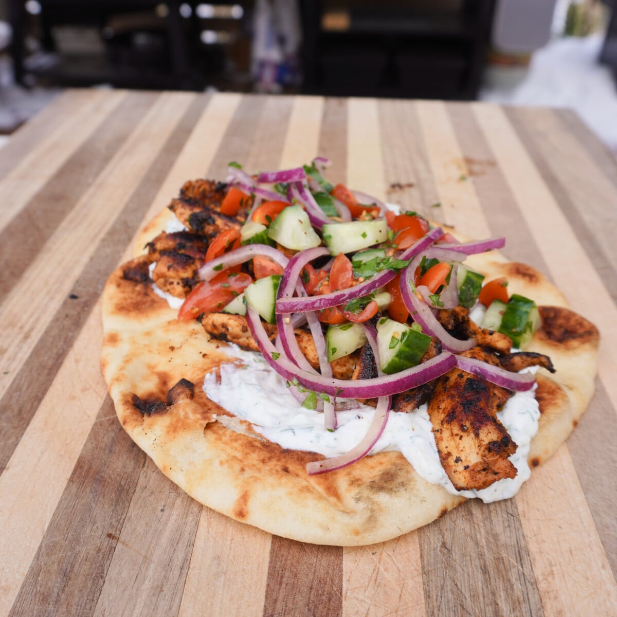 Grilled Chicken Shawarma on a pita.