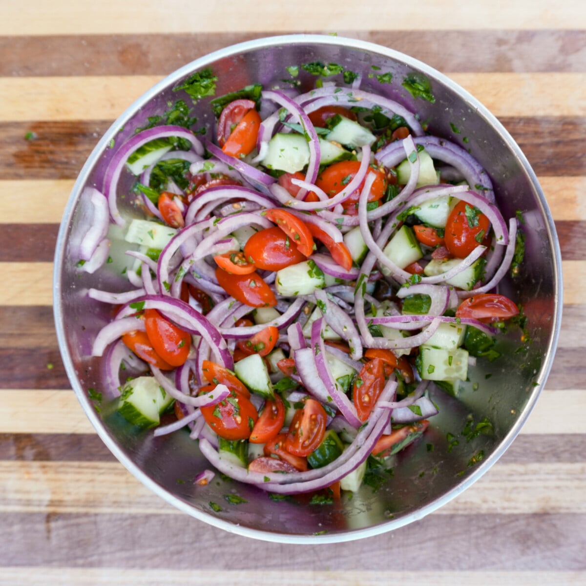 freshly chopped veggies in a blue yeti bowl.