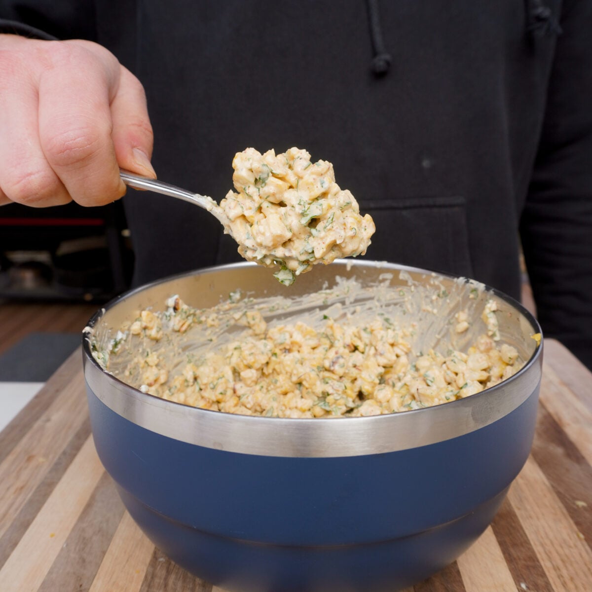 mexican street corn mixed in a bowl.