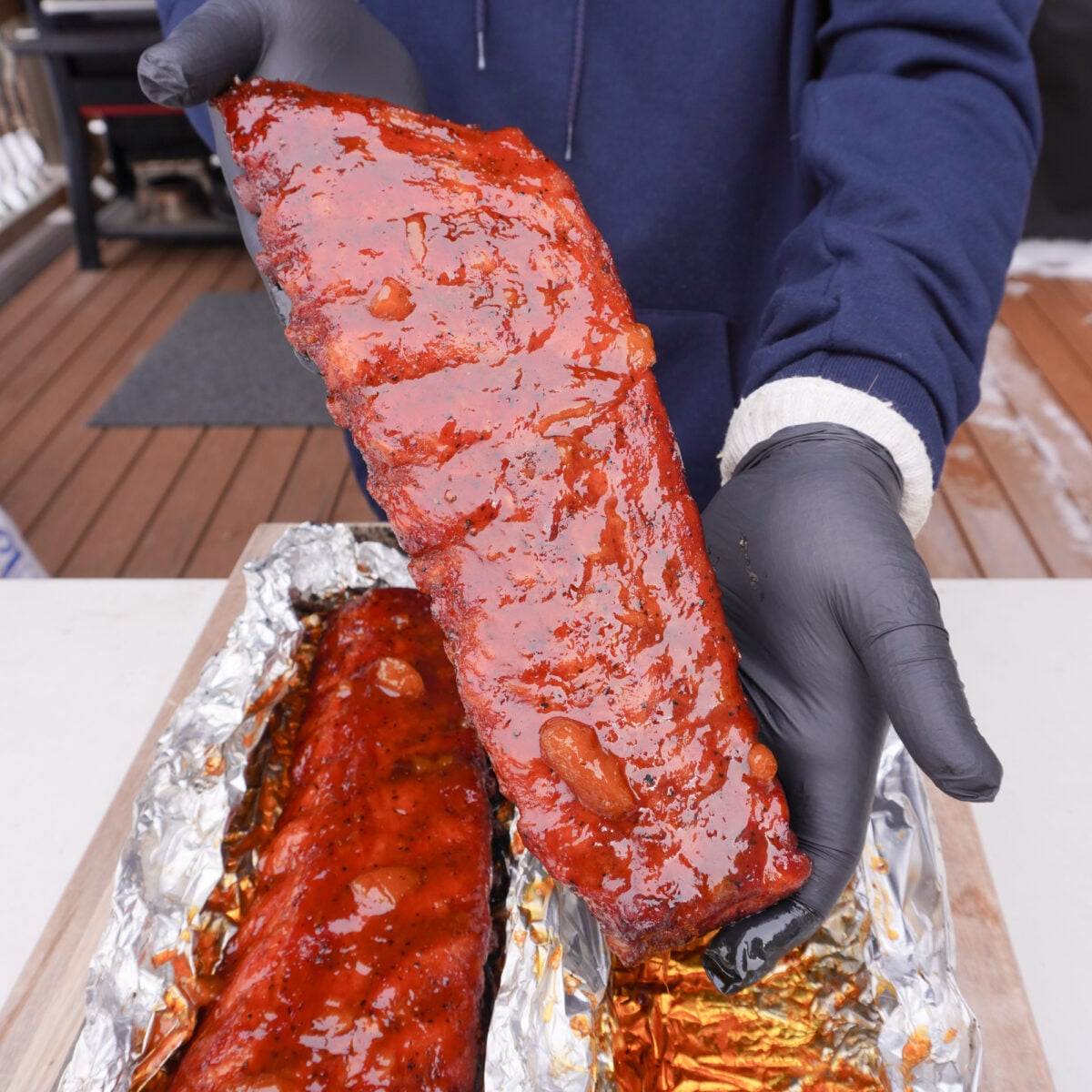 Peach Bourbon Smoked Ribs presented.