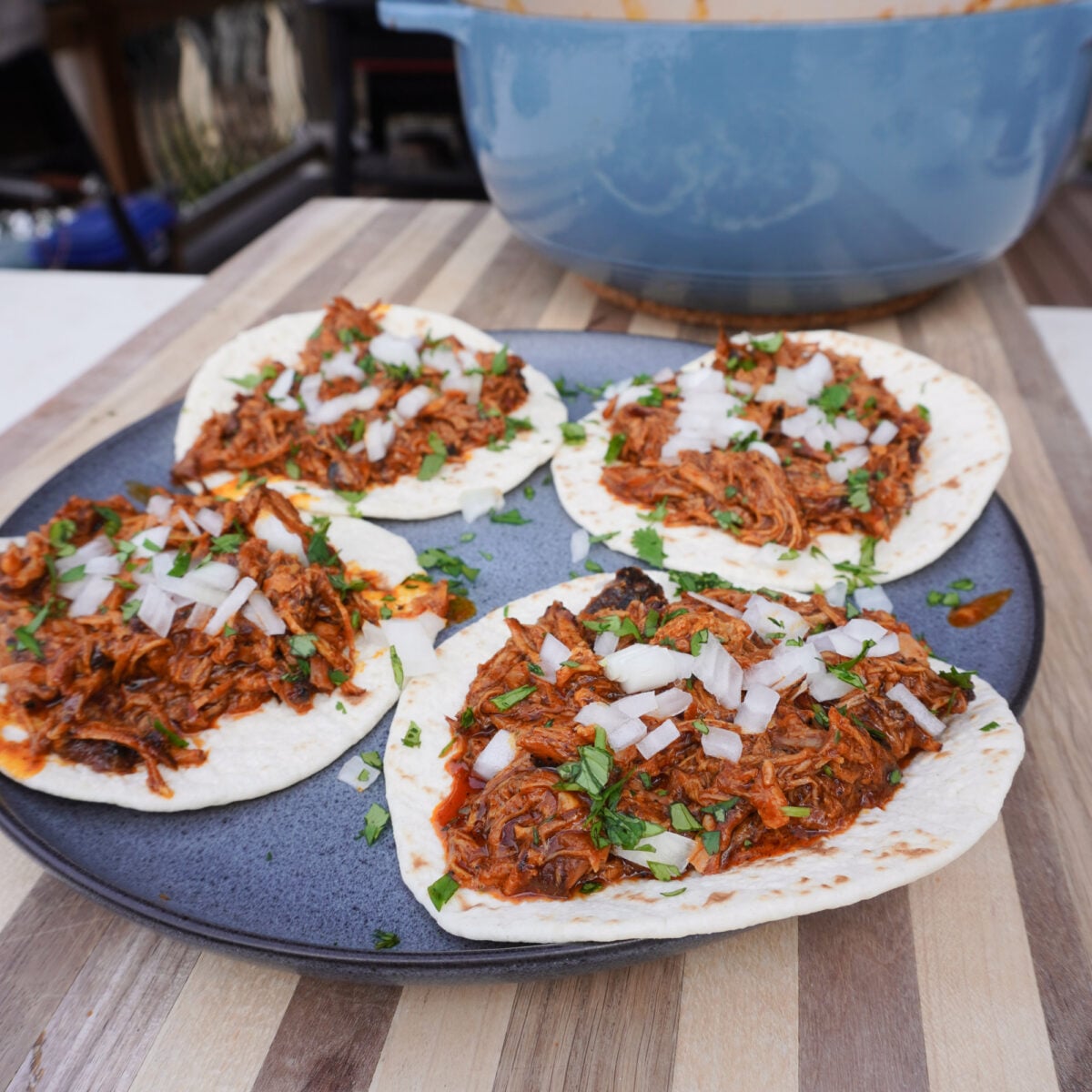 Grilled tacos al pastor plated.