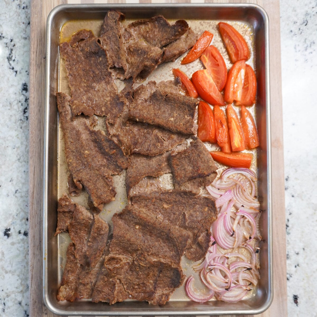 Broiled ground beef kebabs.