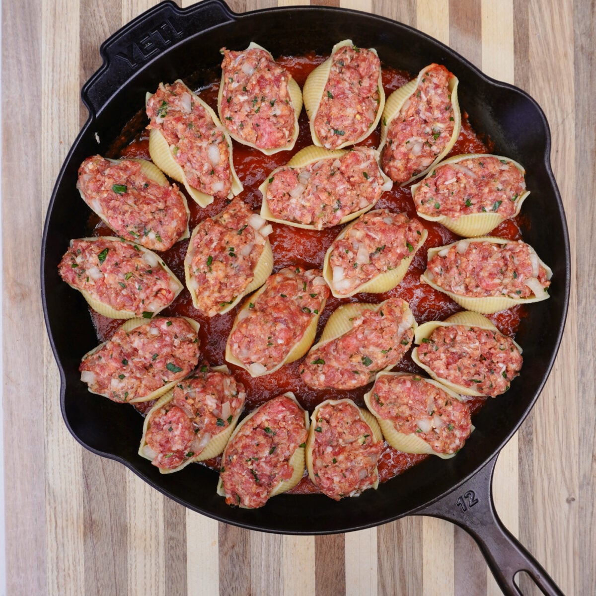 meaty stuffed shells in a Yeti cast iron skillet.