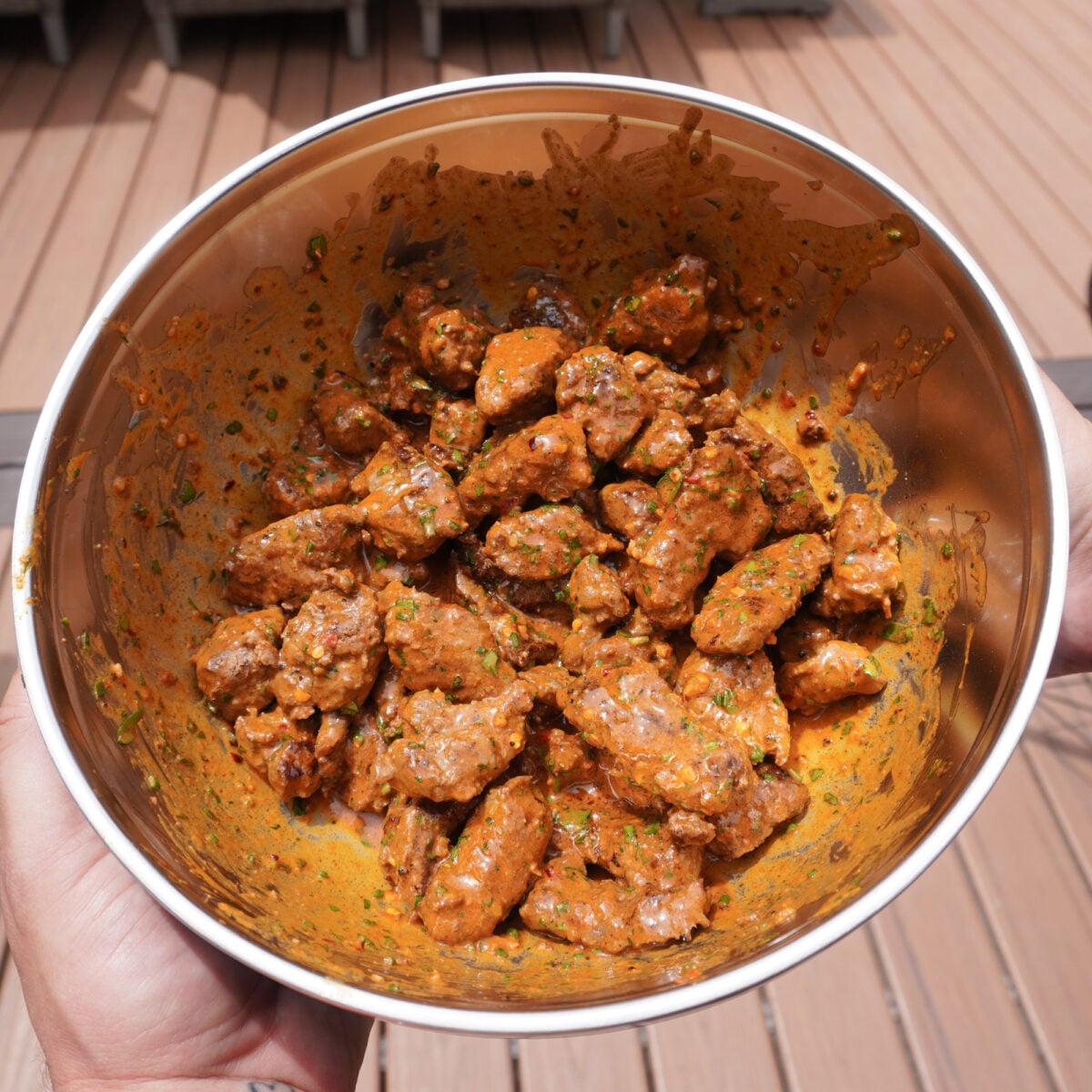 cowboy butter steak bites sauced in a bowl.