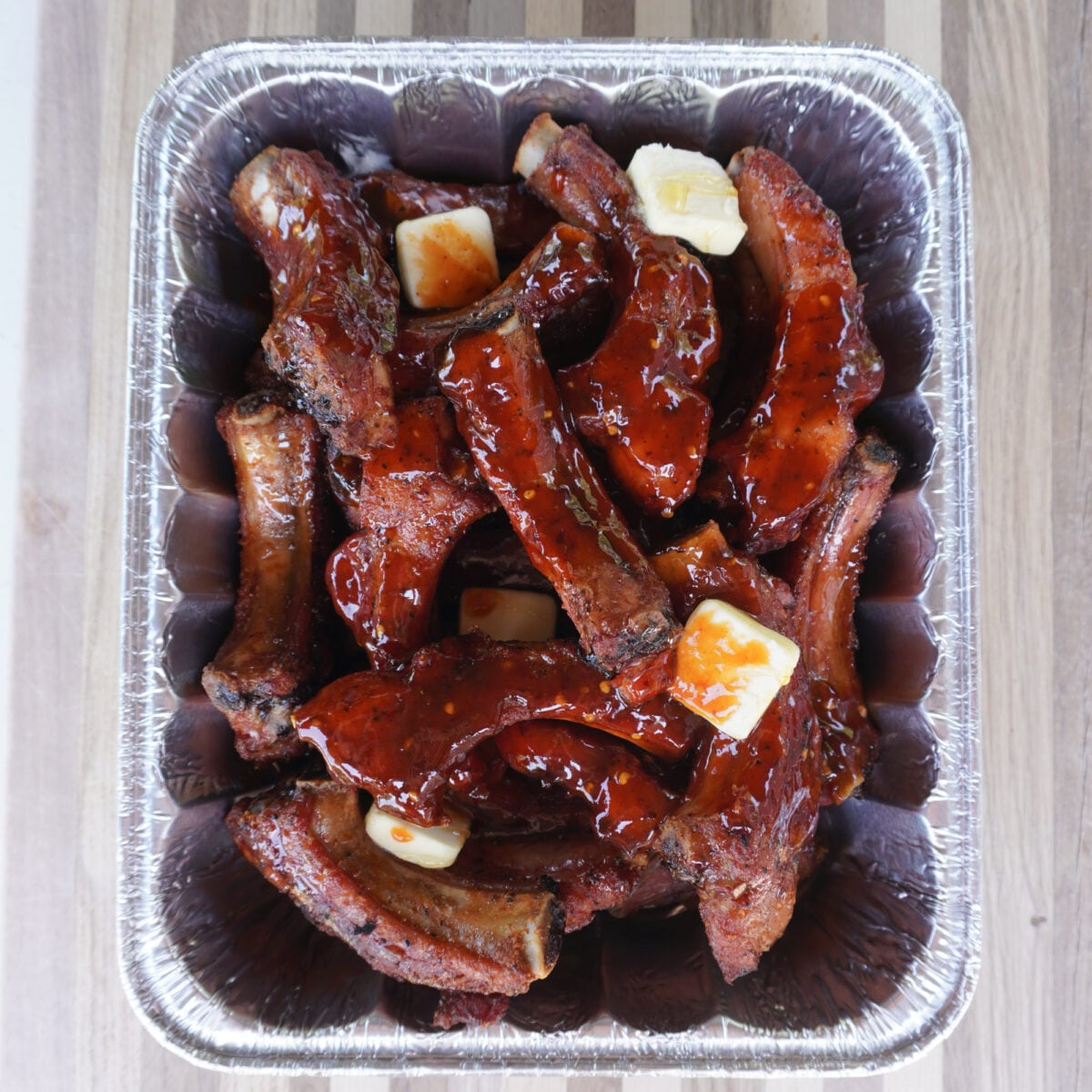 wrapping sweet and spicy party ribs.