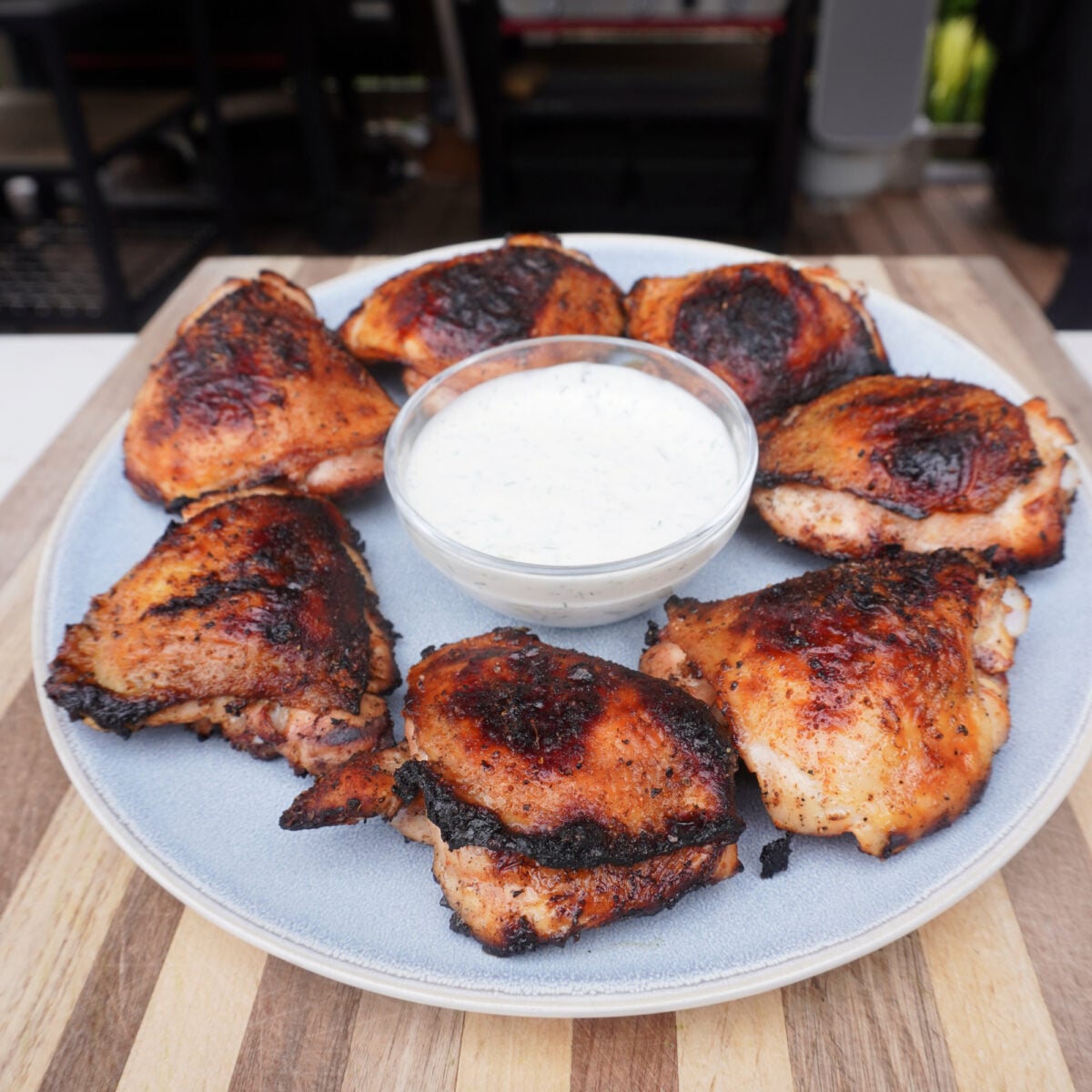 Grilled Pickle Brine Chicken Thighs on plate.