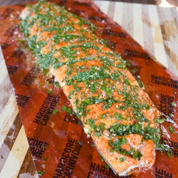 Smoked Salmon with Dill Chimichurri on butcher paper.