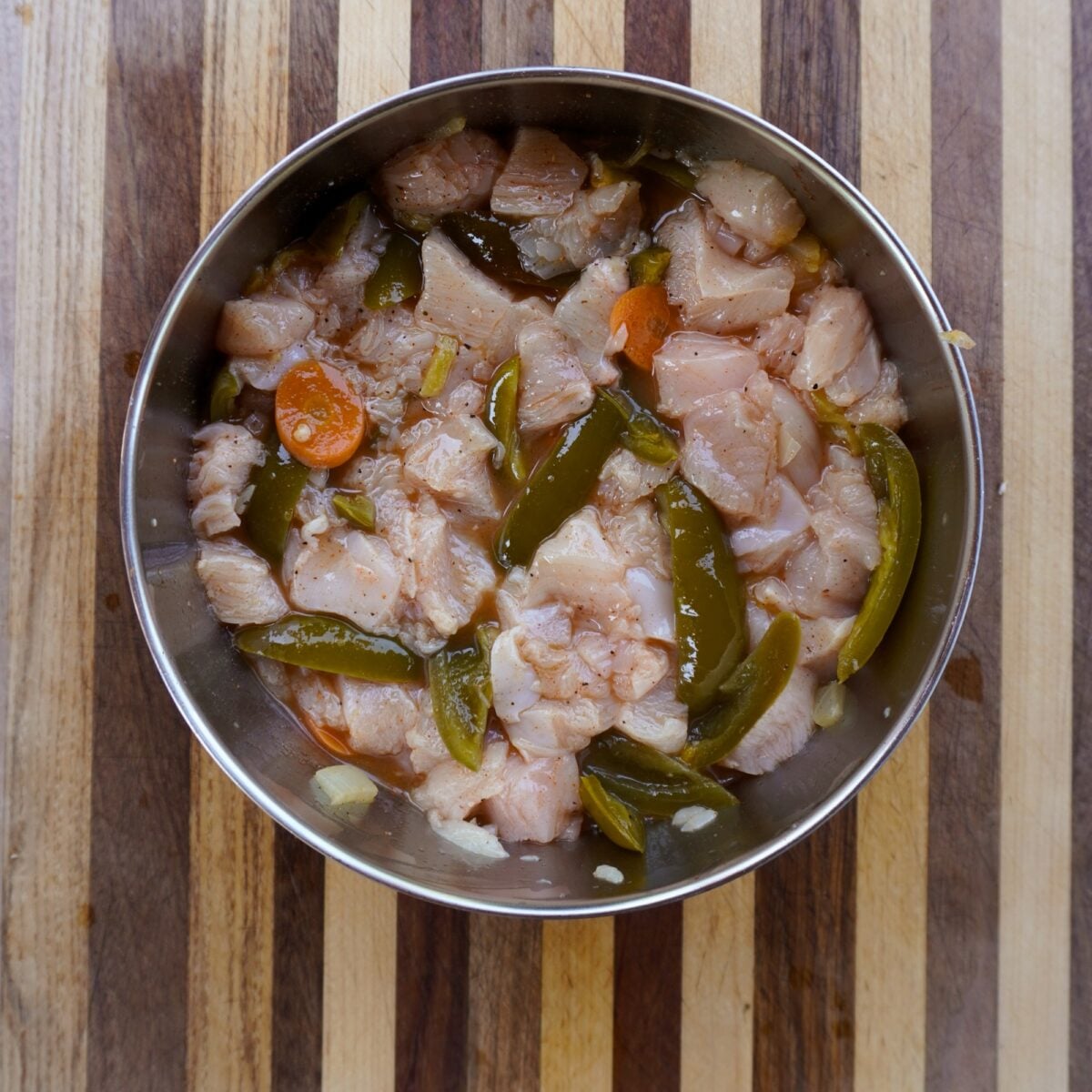 jalapeno brine with cubed chicken inside.