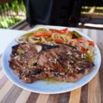 Grilled Savory Pork Steaks plated.