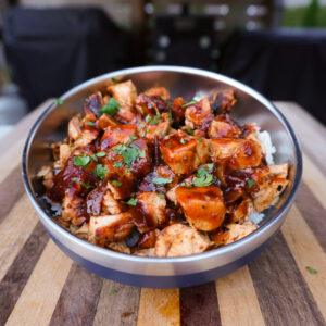 Grilled Chipotle Chicken Copycat in bowl on cutting board.