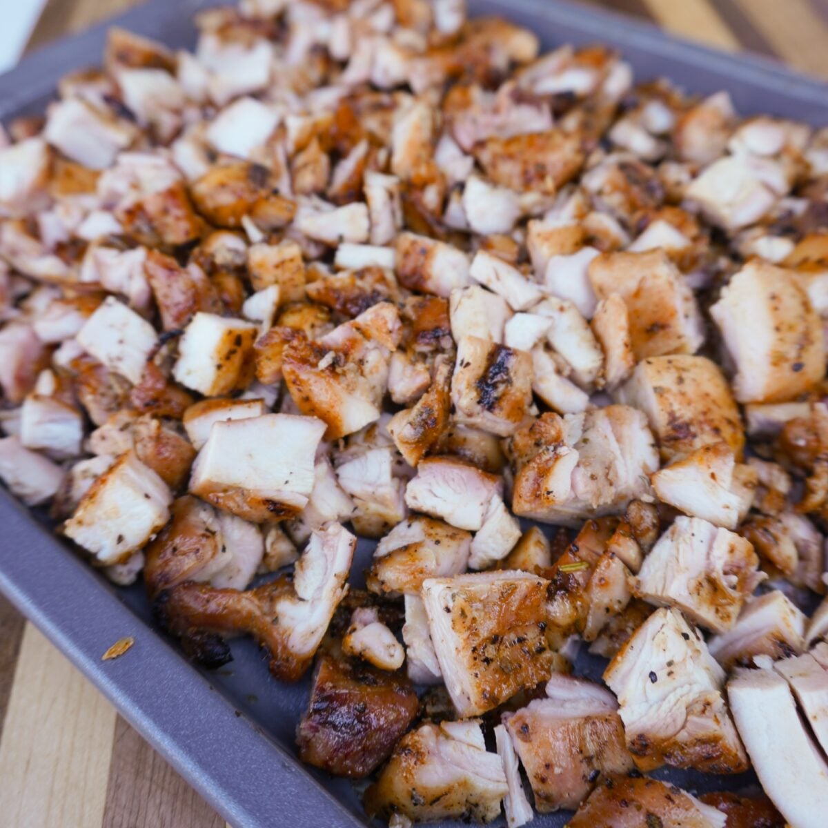 Cubed up grilled chicken thighs.
