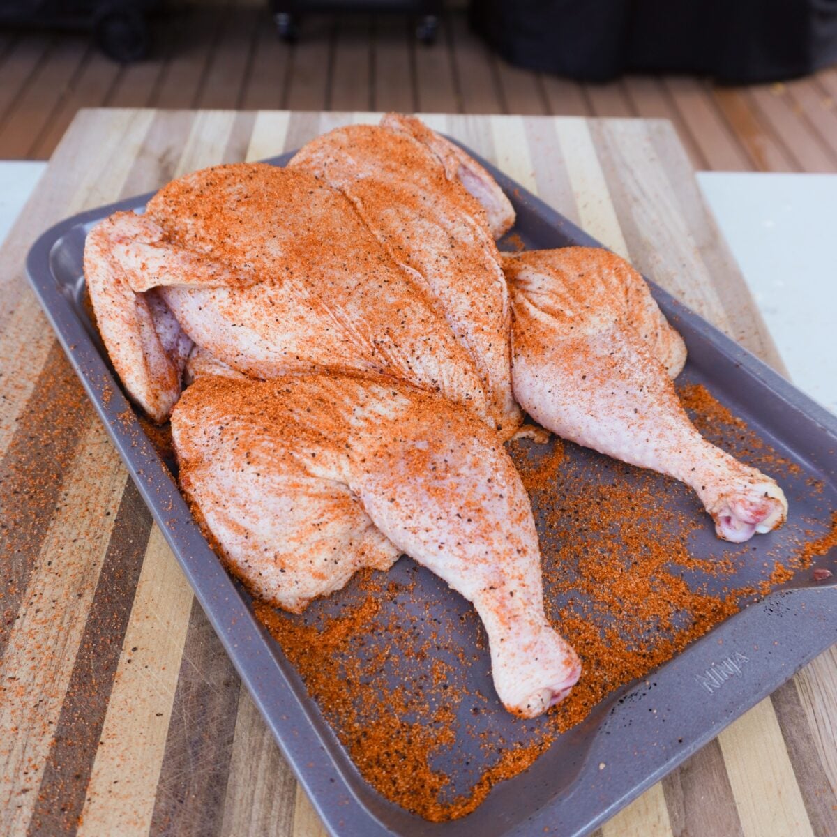Seasoned spatchcocked chicken.