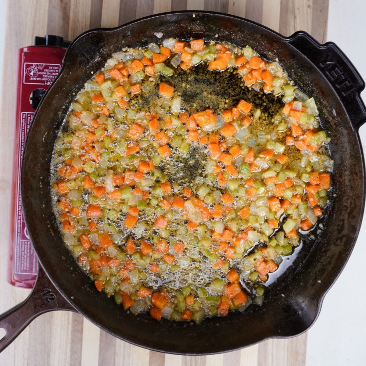 Sauteed veggies in cast iron skillet.